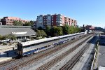 Amtrak Train # 536, heading from Oakland Jack London Square to Sacramento, slows for the stop with Amtrak California Bilevel Cab Control Car # 8306 on the point 